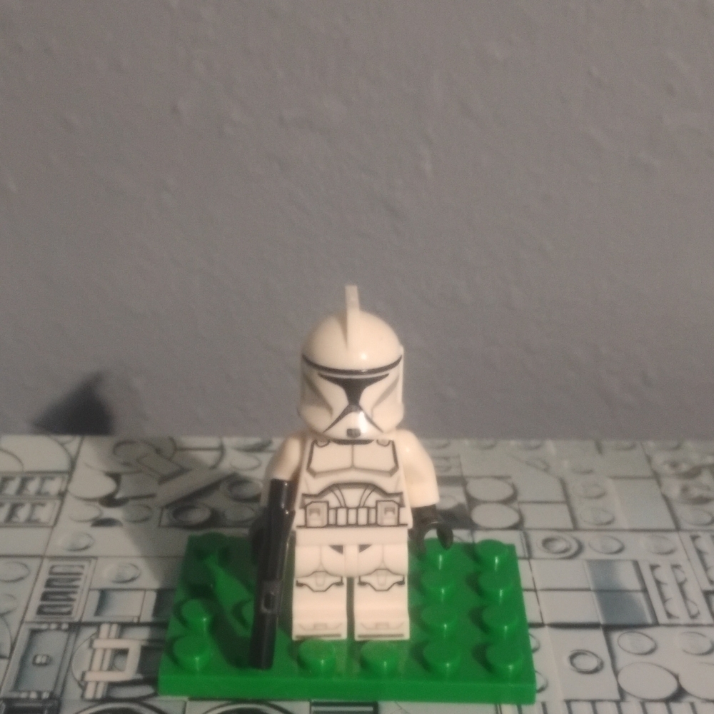 LEGO White and Black Minifigure on Green Base